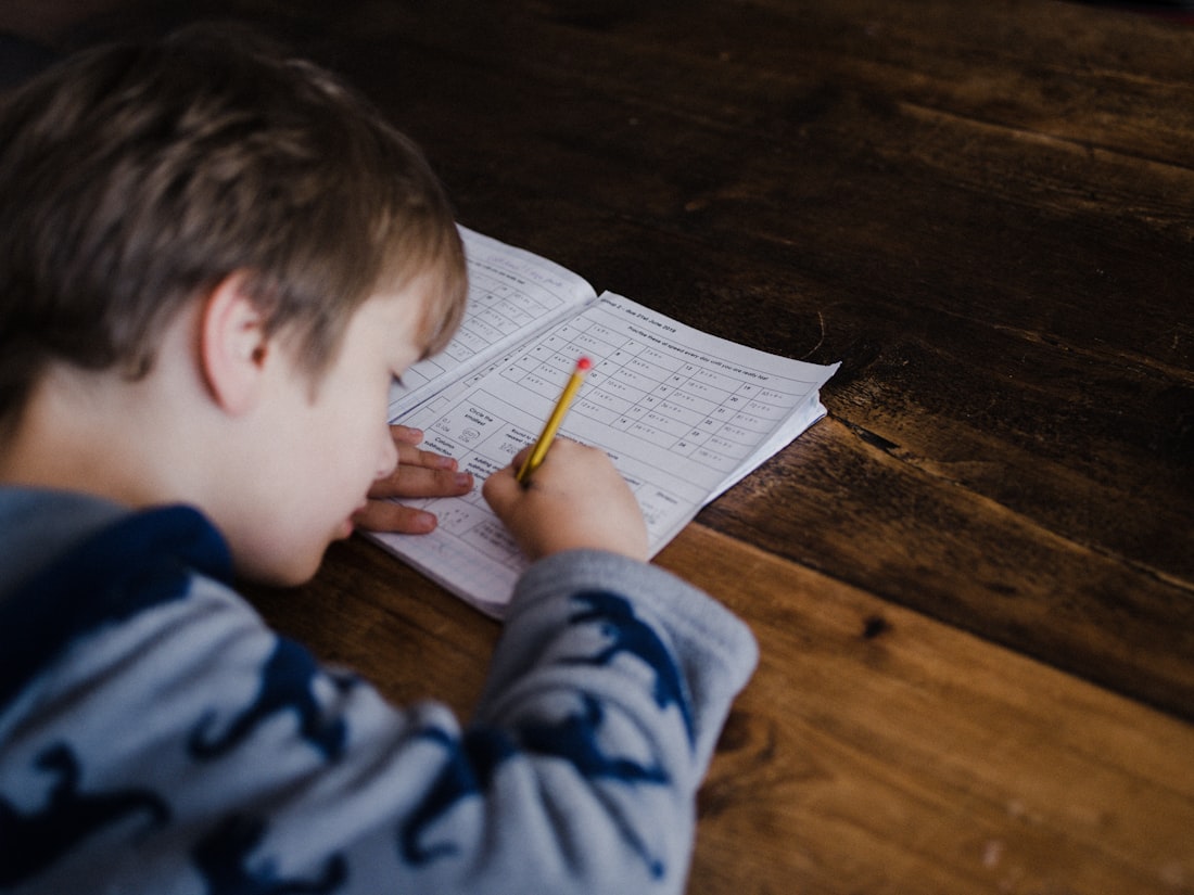 Child working on math problems