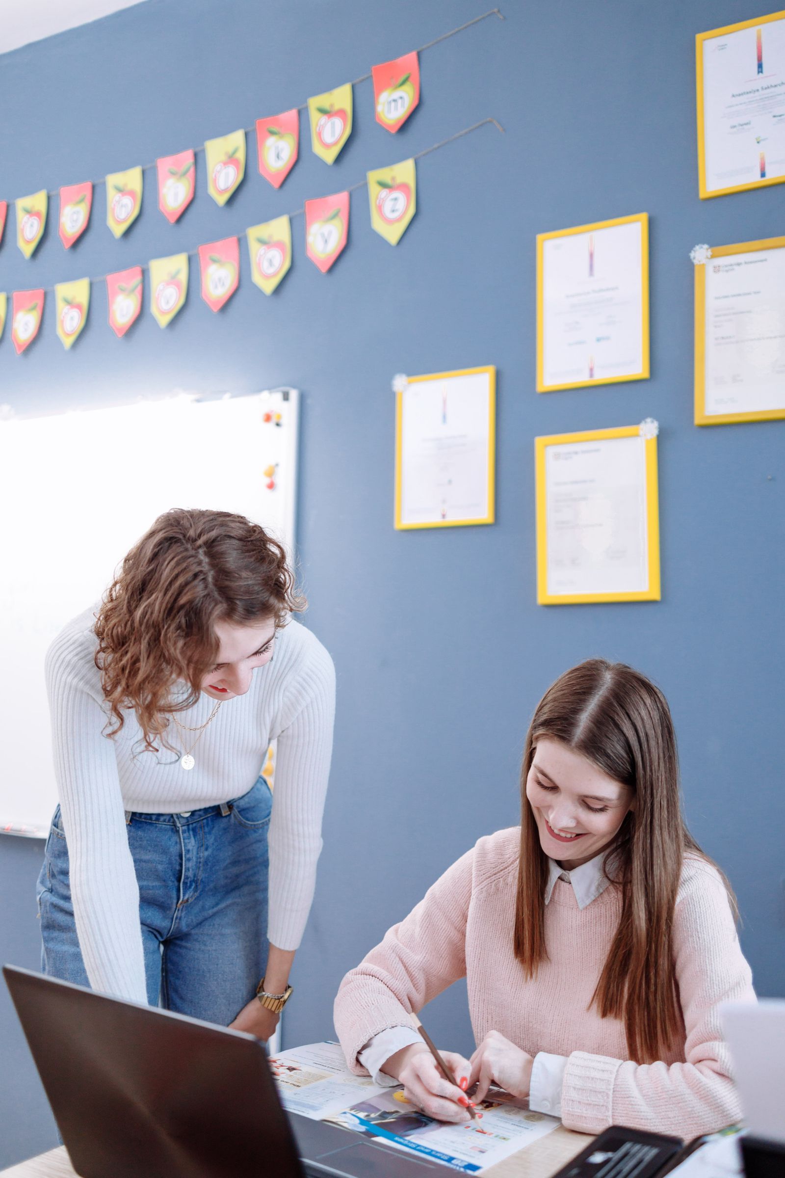 Tutor reviewing SAT questions with a student